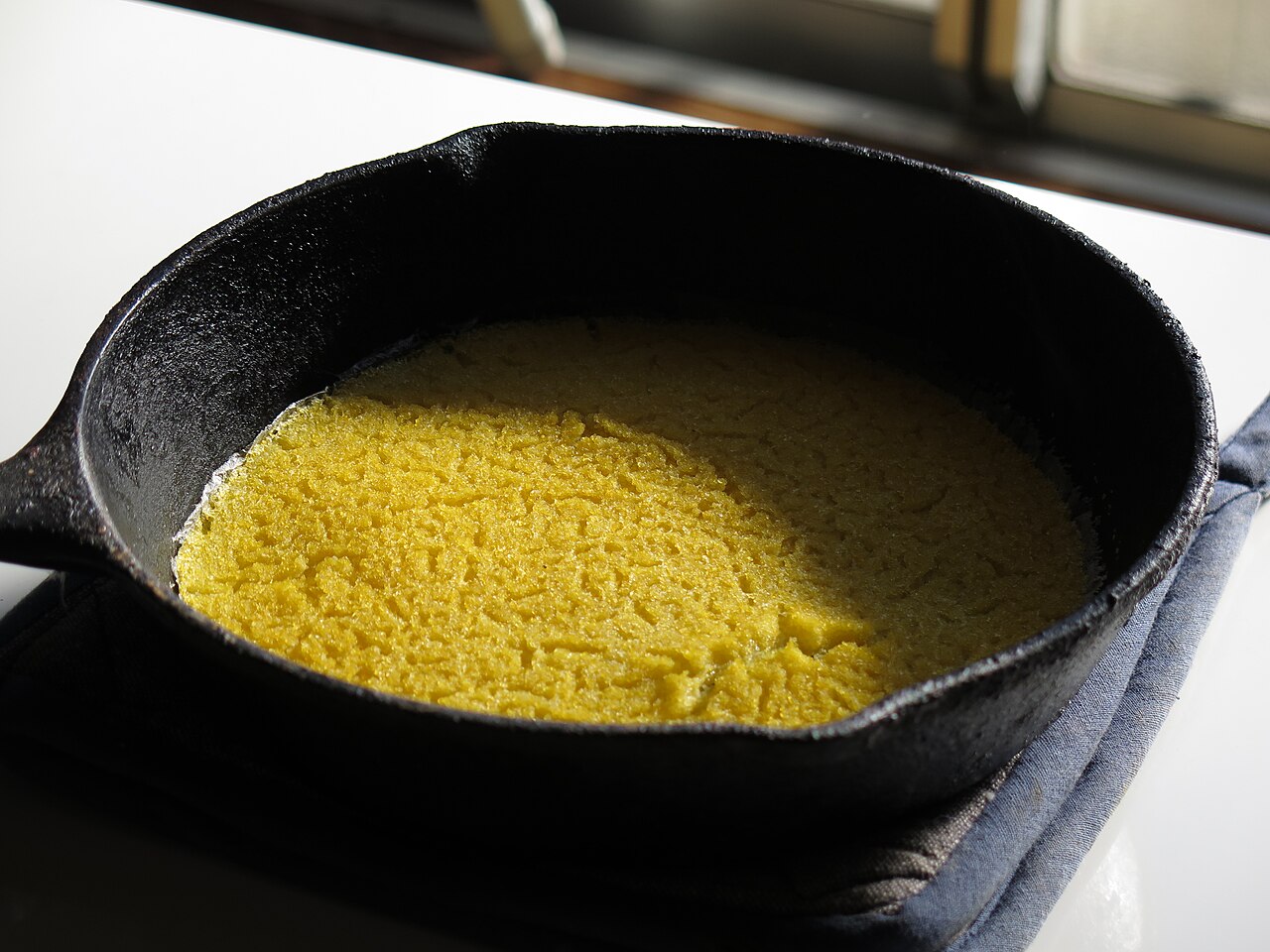 Cornmeal johnnycakes, close relatives of hoe cakes.